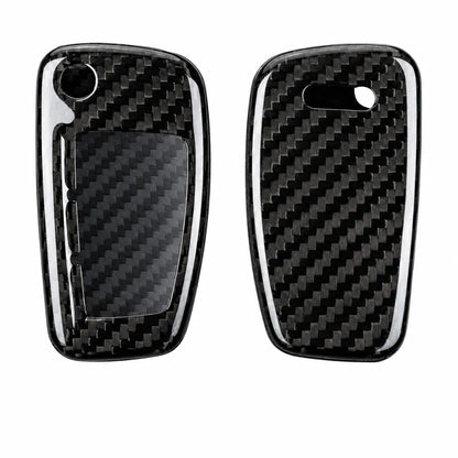 Two glossy carbon fiber car key fob case covers shown side by side on a plain white background, with one cover displaying the front face and the other the back face.