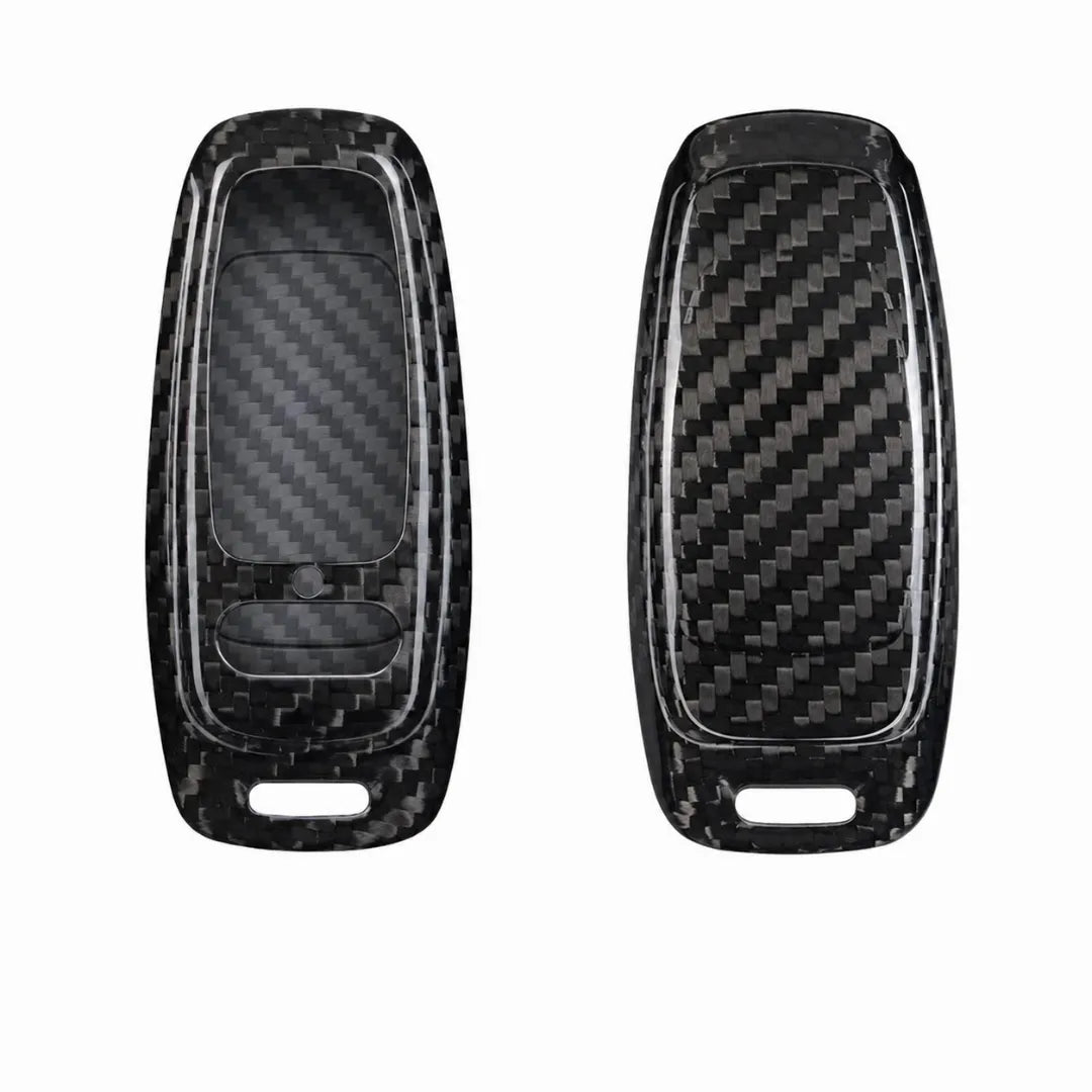 Two black carbon fiber textured key fob covers shown side by side on a plain white background.