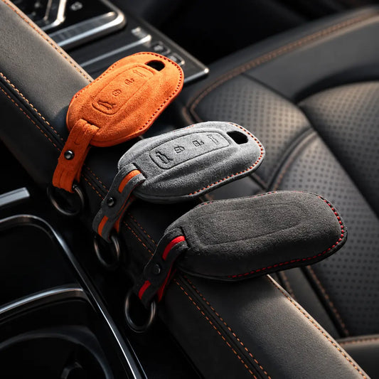 Luxury Alcantara Key Fobs On Car Console For Porsche