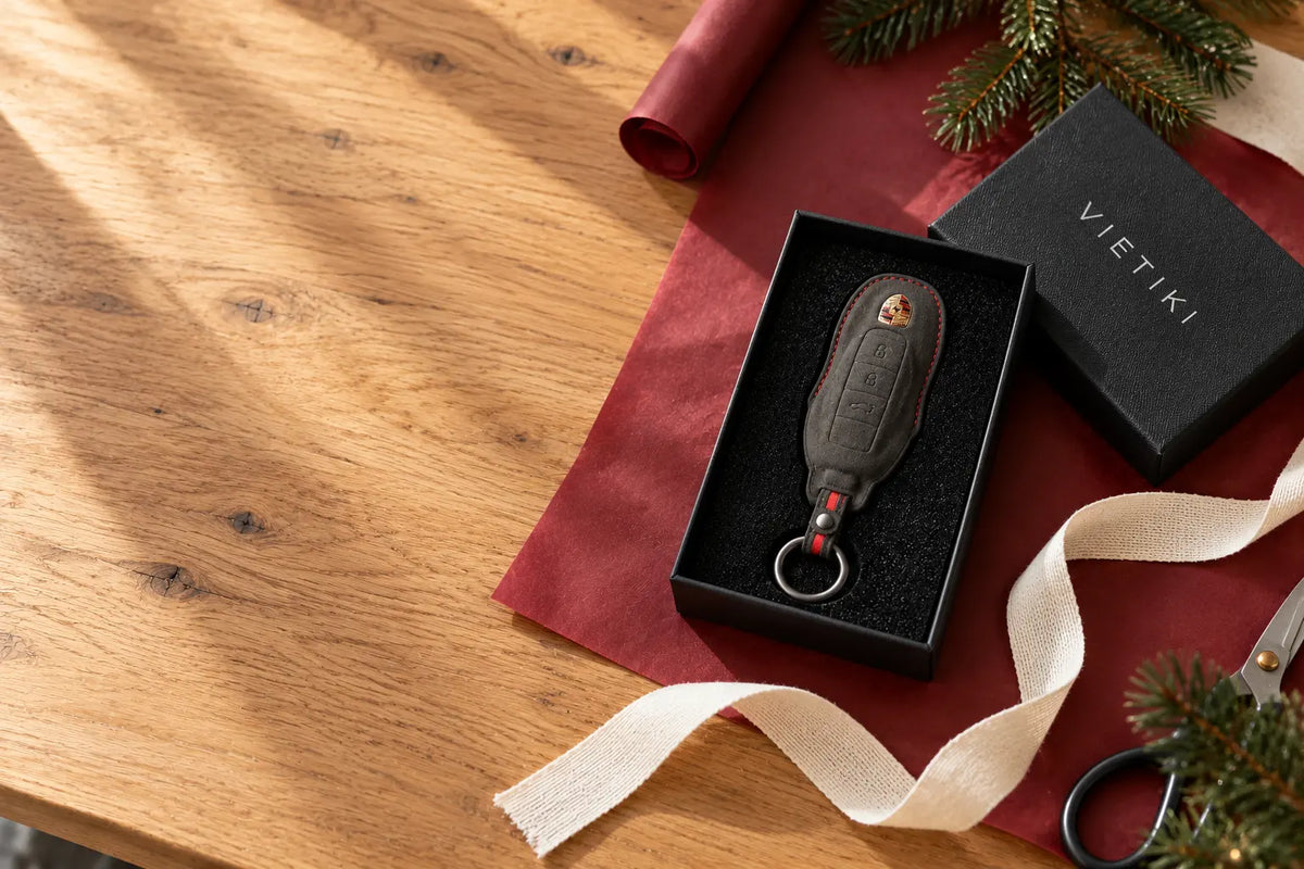 VIETIKI gift box with a hand-stitched Alcantara key cover on a wooden table