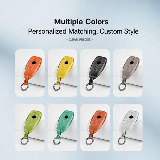 A promotional graphic showing eight personalized car key fob covers in different colors, arranged in a grid with text at the top reading 'Multiple Colors' and 'Personalized Matching, Custom Style'. The covers are shown in orange, yellow, black, taupe, lime green, mint green, and white, each with a metal key ring.
