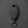 Nissan Hand-Stitched Alcantara Key Fob Cover – Oval 3-Button Panic